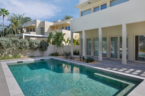 hsn-apricot-sanded-exterior-swimming-pool-villa-side