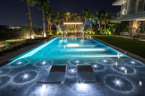 hsn-white-cloud-sanded-exterior-swimming-pool-baja-shelf-nighttime-lighting